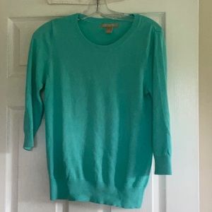 Banana Republic teal knit sweater.  Sleeves are 3/4 length.
